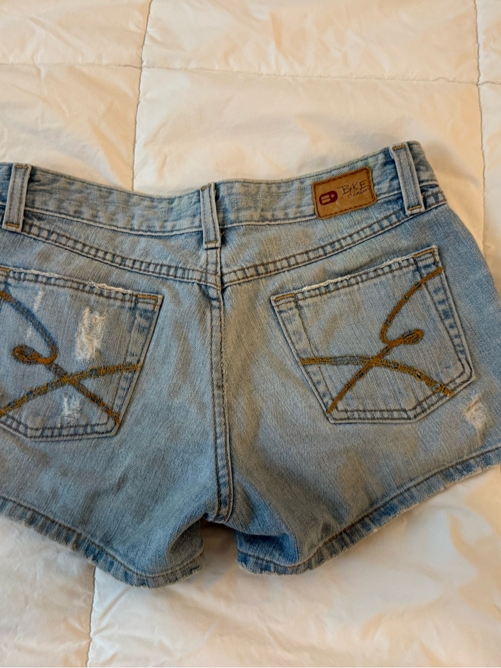 Ecko Unlimited Light Blue Denim Cutoff Shorts with Gold Back Pocket Detail